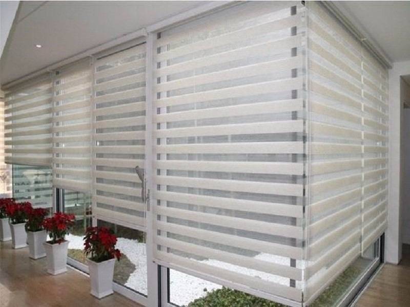 Persianas Sheer Elegance en ventanales